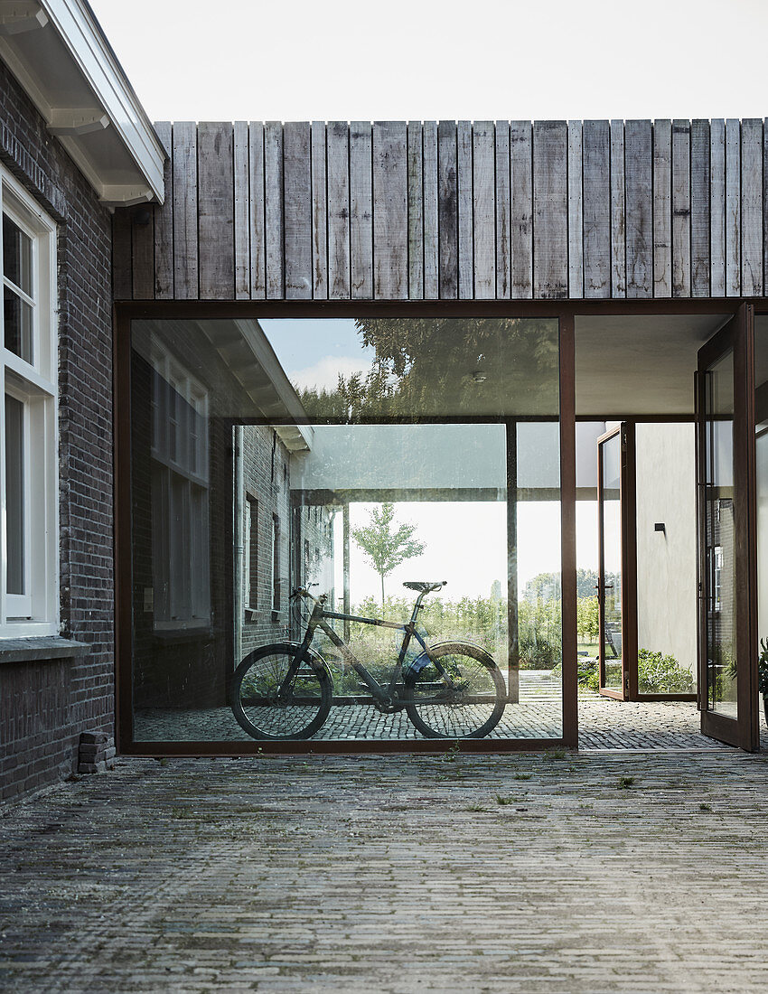 Bicycle in glazed passage
