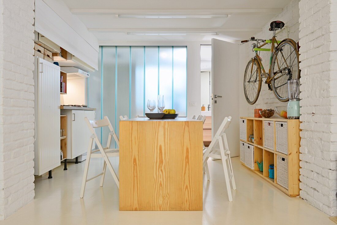 Kitchen in small industrial-style maisonette apartment