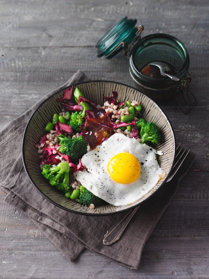 Vegetarian buckwheat bowl with broccoli and fried egg (Sirtfood)