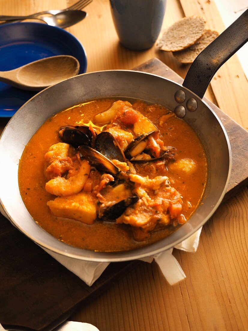 Caciucco alla livornese in pan, tuscan traditional fish soup, Tuscany, Italy