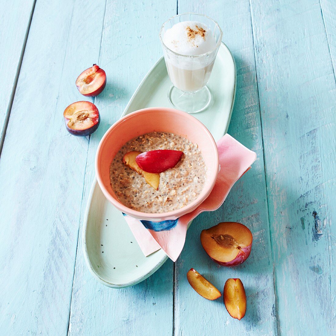 Muesli with plums and a chai latte