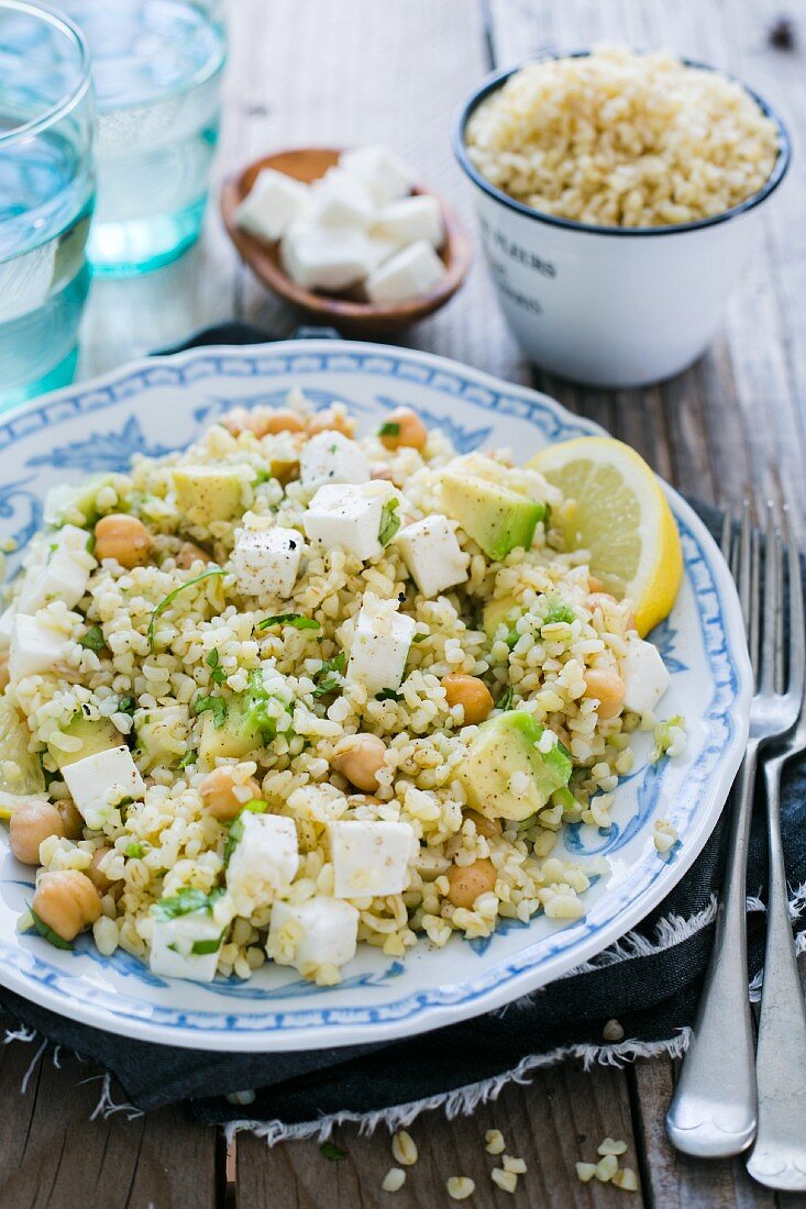 A bulgur wheat salad with tofu, chickpeas and avocado (vegan)