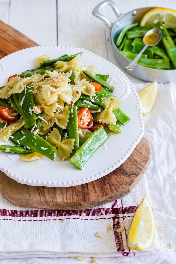 A pasta salad with green beans and lemon vinaigrette