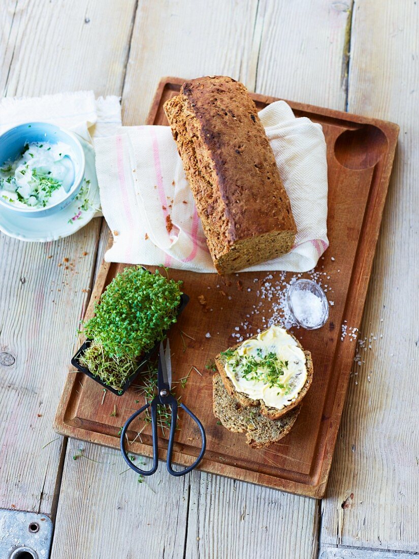 Homemade spice bread with butter and cress