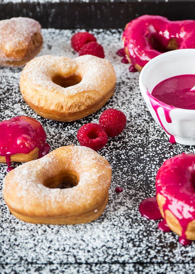 Heart shaped doughnuts with a raspberry glaze