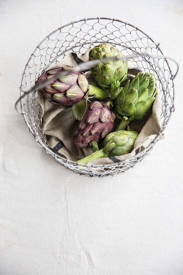 Artichokes in wire basket