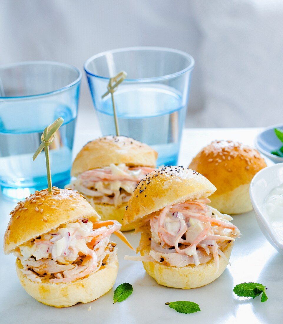Mini hamburgers with pulled chicken and coleslaw