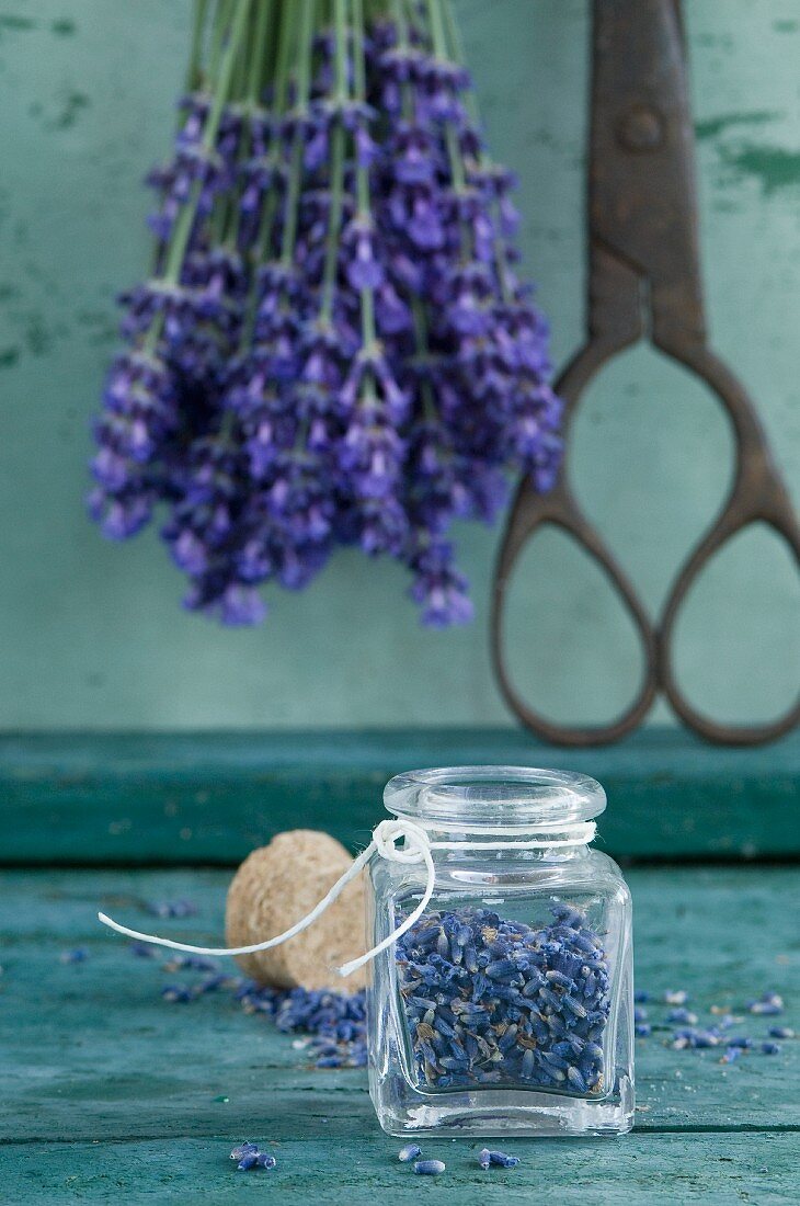 Glass of dried lavender blossoms