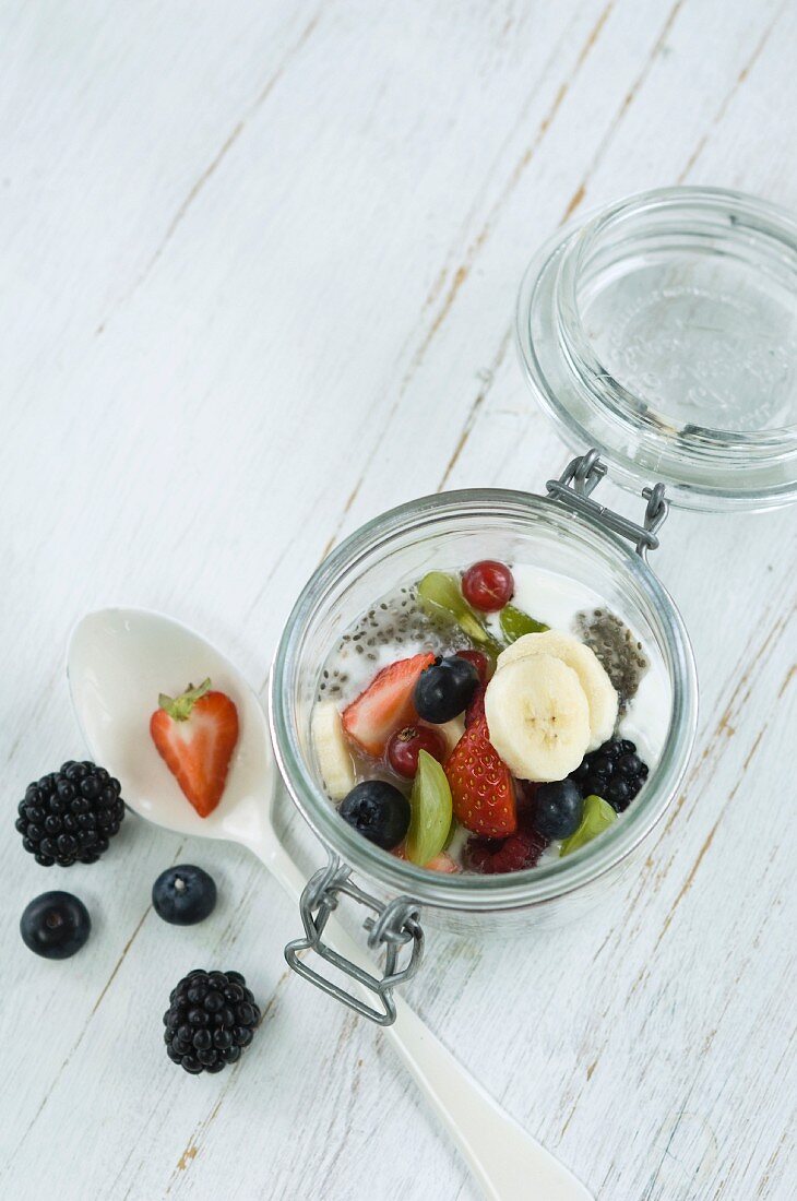 Chia pudding with fresh fruits in glass