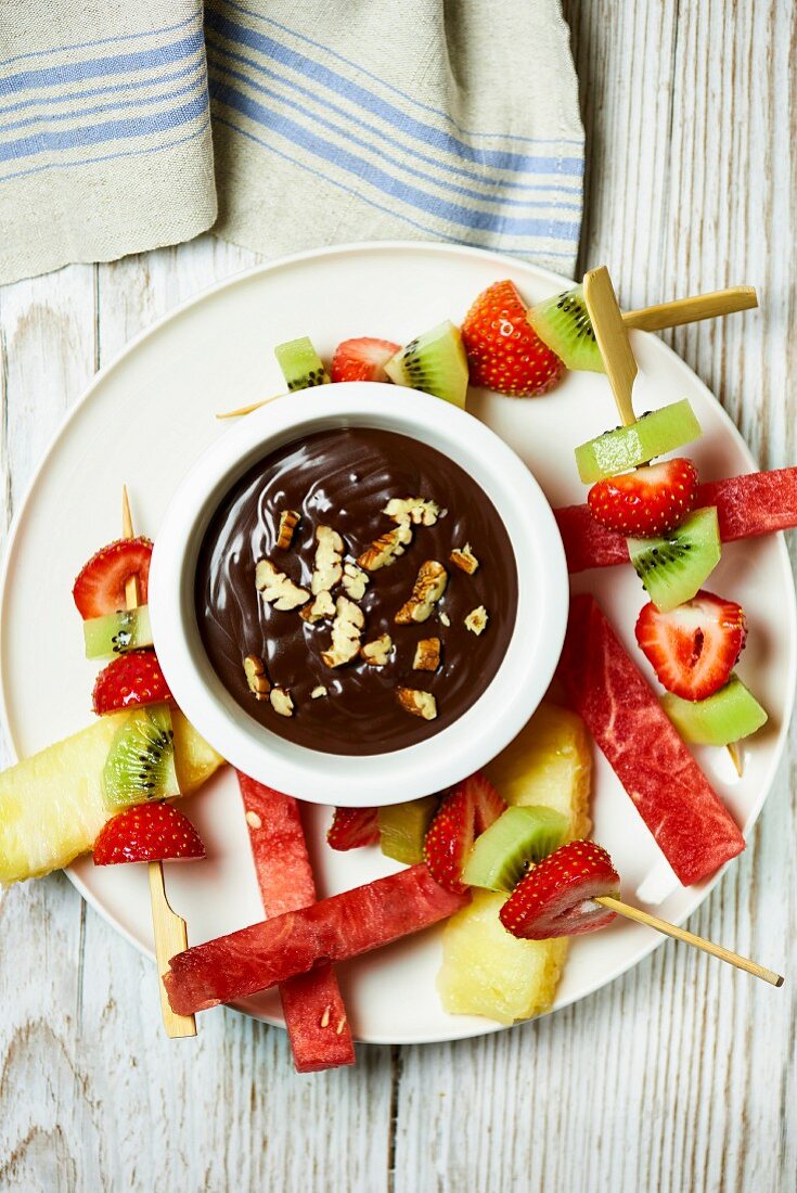 Fruit kebabs with chocolate sauce