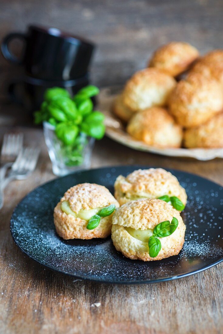 Fried pastry biscuits with basil and white chocolate cream