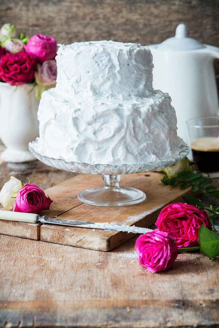 A rose water layer cake covered with meringue