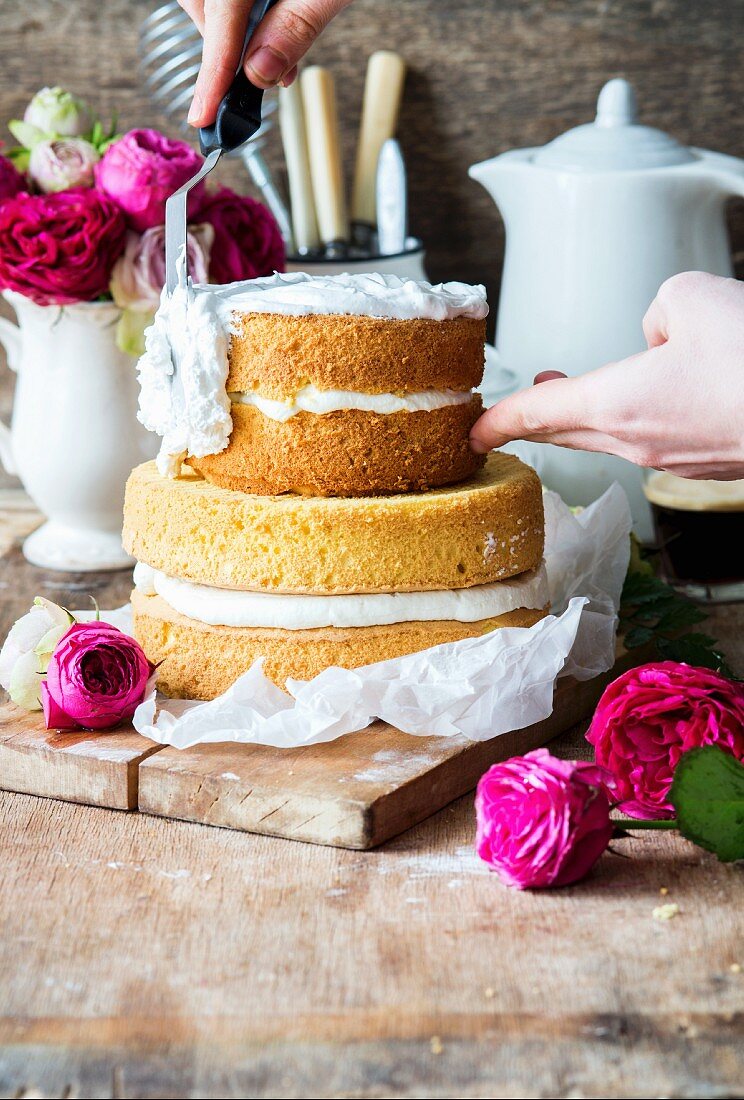 A rose water layer cake covered with meringue