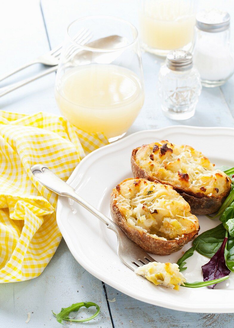 Baked Potato halves filled with cheese and leeks
