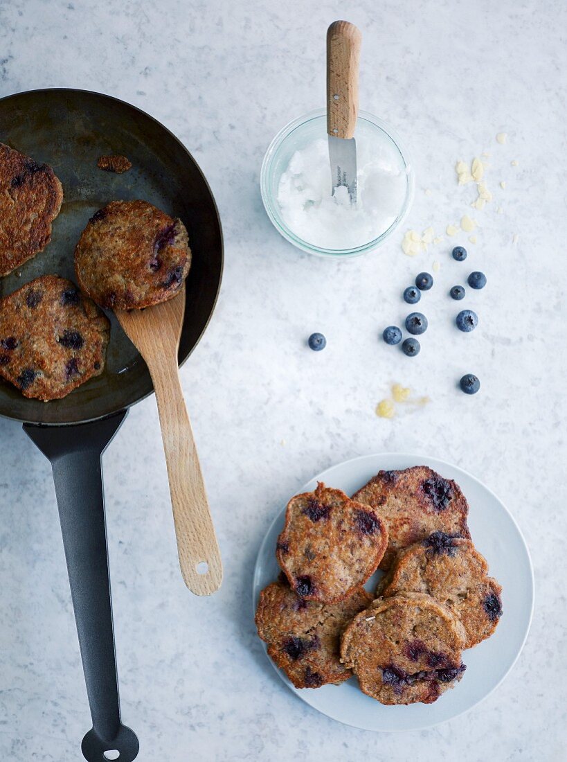 Banana and almond pancakes with blueberries