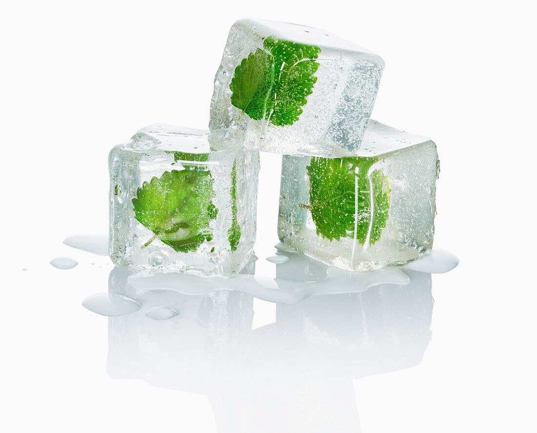 Three ice cubes with melissa