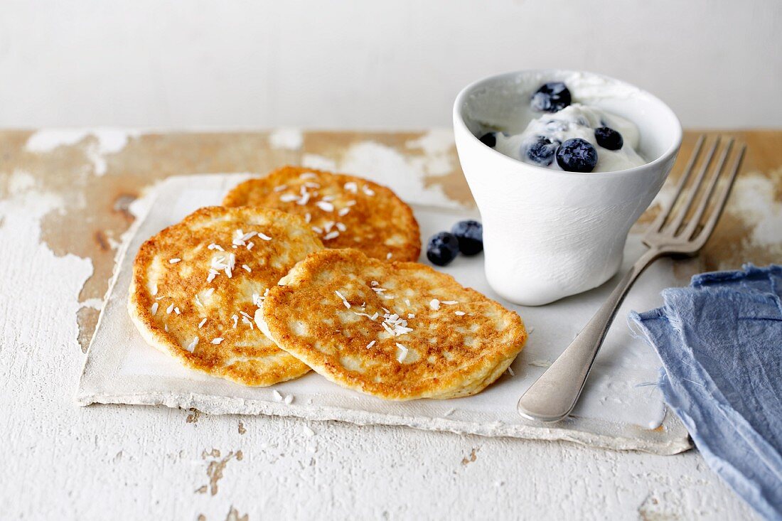 Coconut pancakes with blueberry and coconut yoghurt