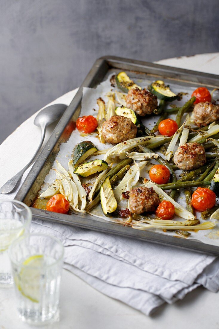 Marinated summer vegetables with meatballs fresh from the oven