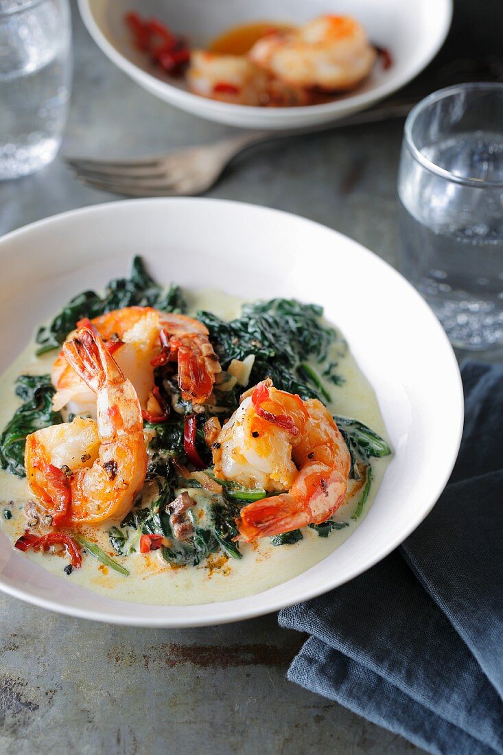 Chilli and lemon prawns on a bed of creamy spinach