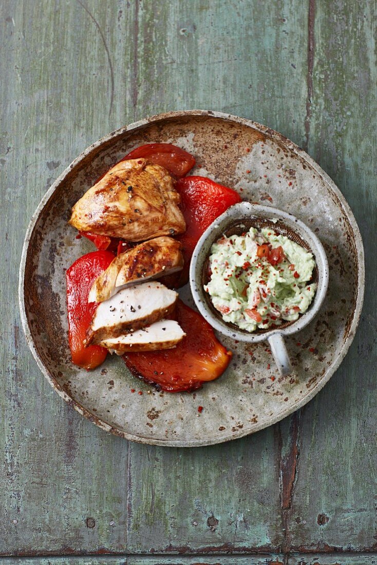 Chicken with avocado on grilled red pepper
