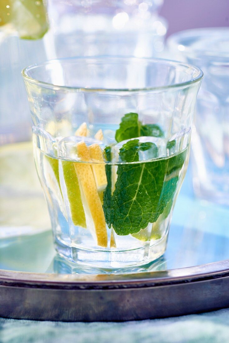Lemon water with mint in a glass