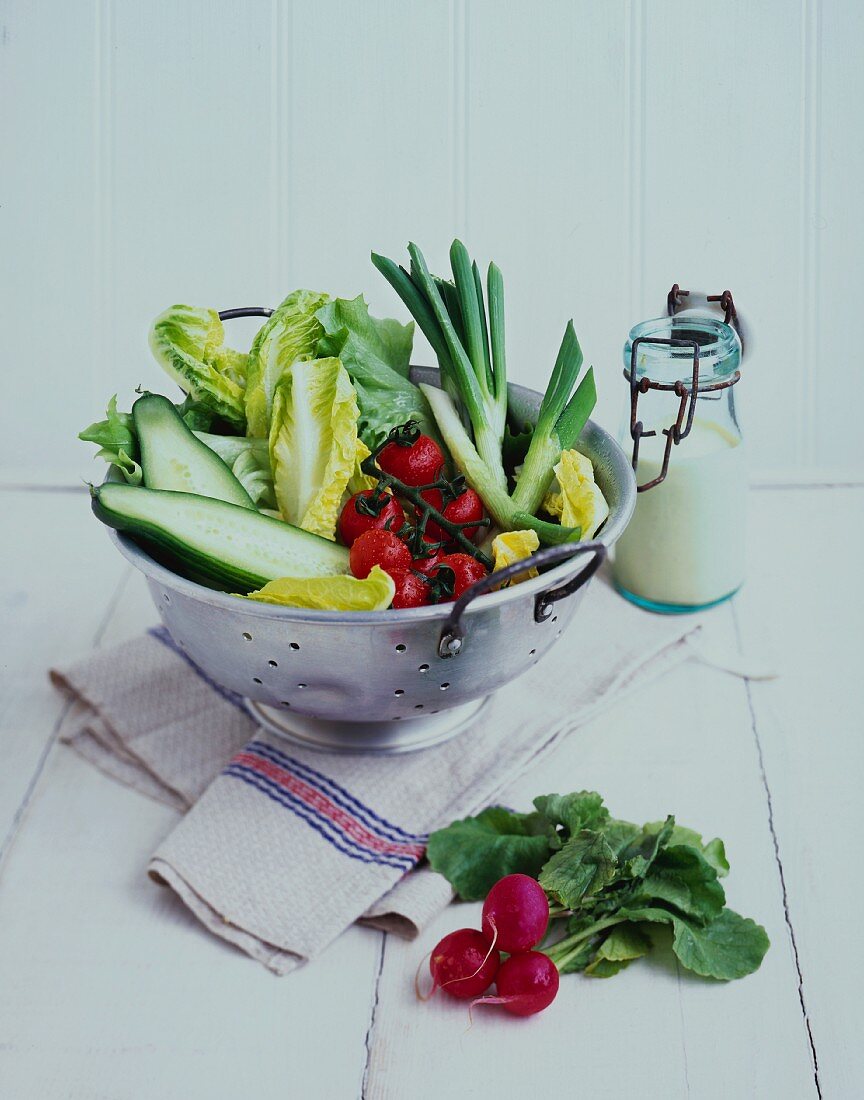Fresh vegetables in a colander