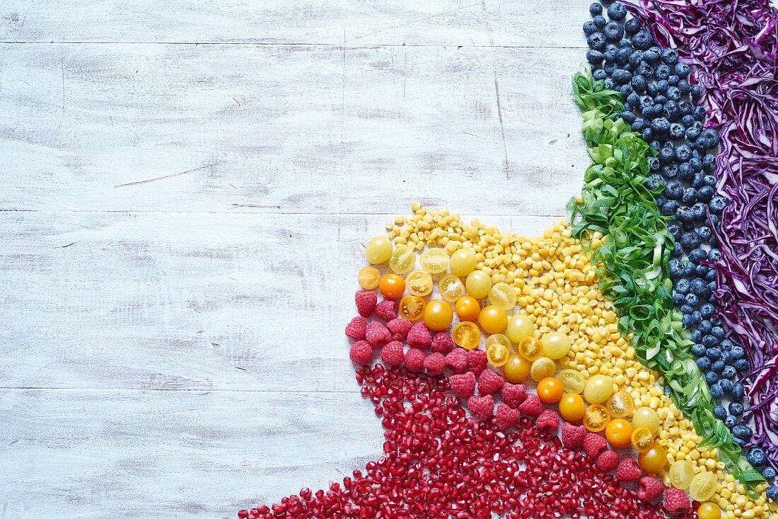 Fruit, herbs and vegetables in rainbow colours