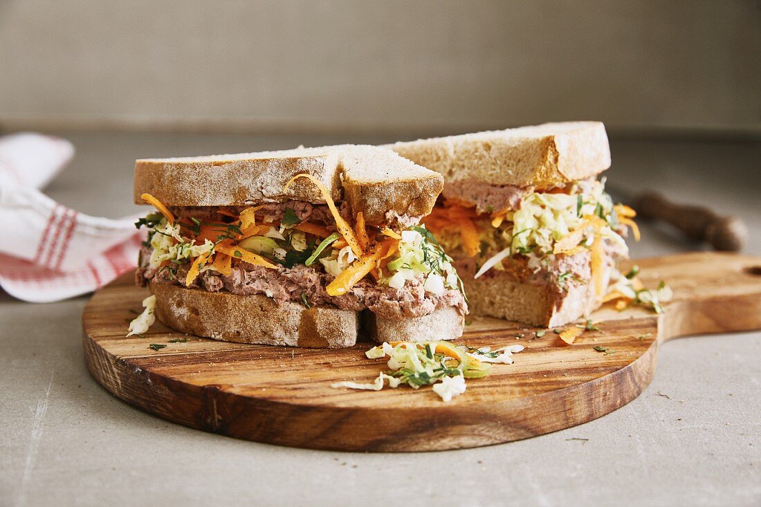 A sandwich with liver sausage and Chinese cabbage and ginger