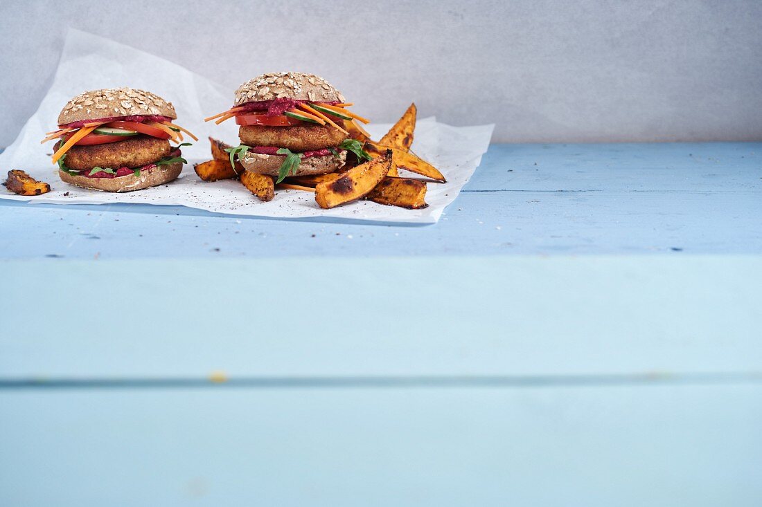 Cauliflower burgers with sweet potato wedges