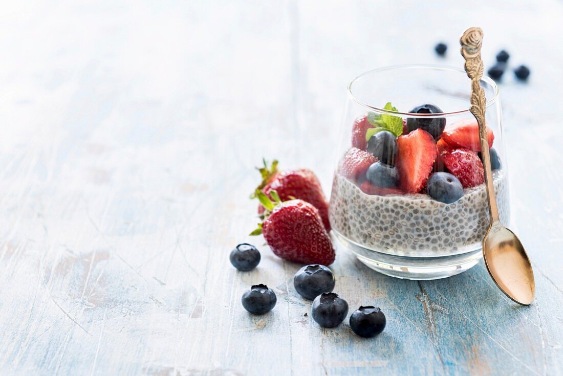 Chia pudding with berries in a glass