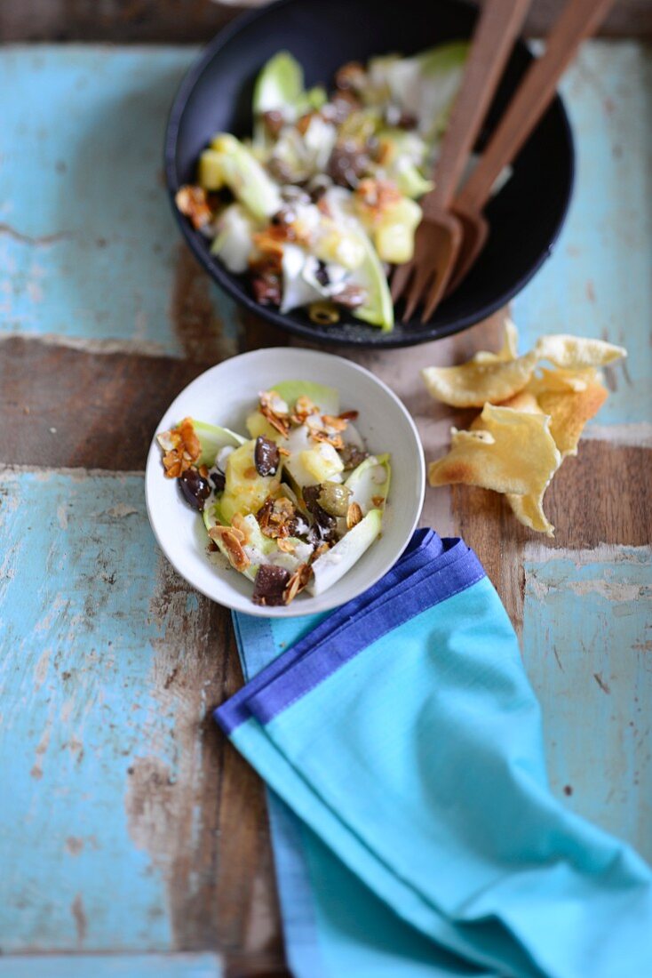 Chicory and olive salad with caramelised almonds