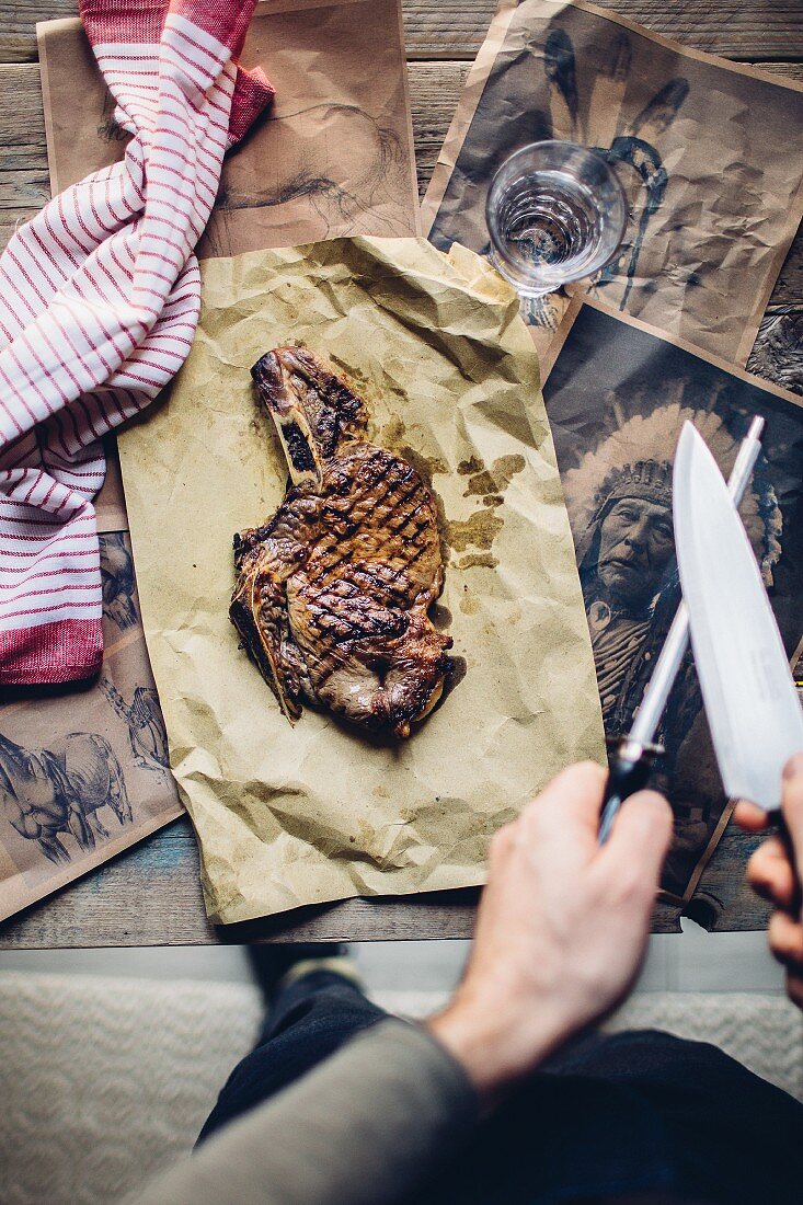 A grilled horse steak on baking paper