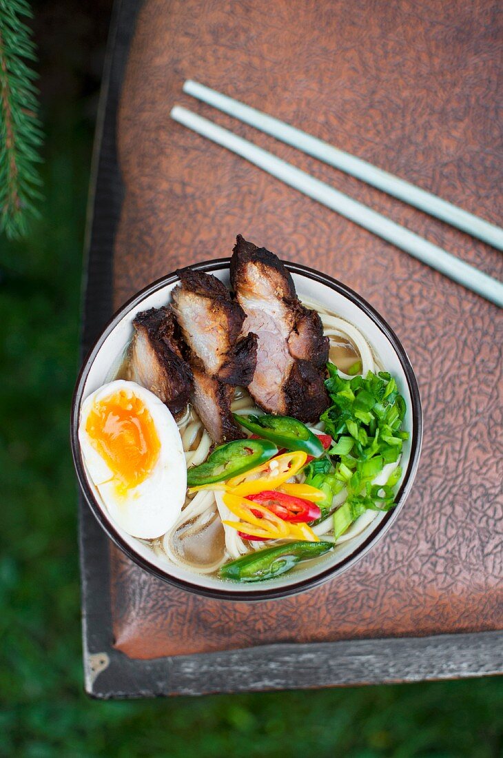 A bowl of ramen soup with pork and hard-boiled egg (Japan)