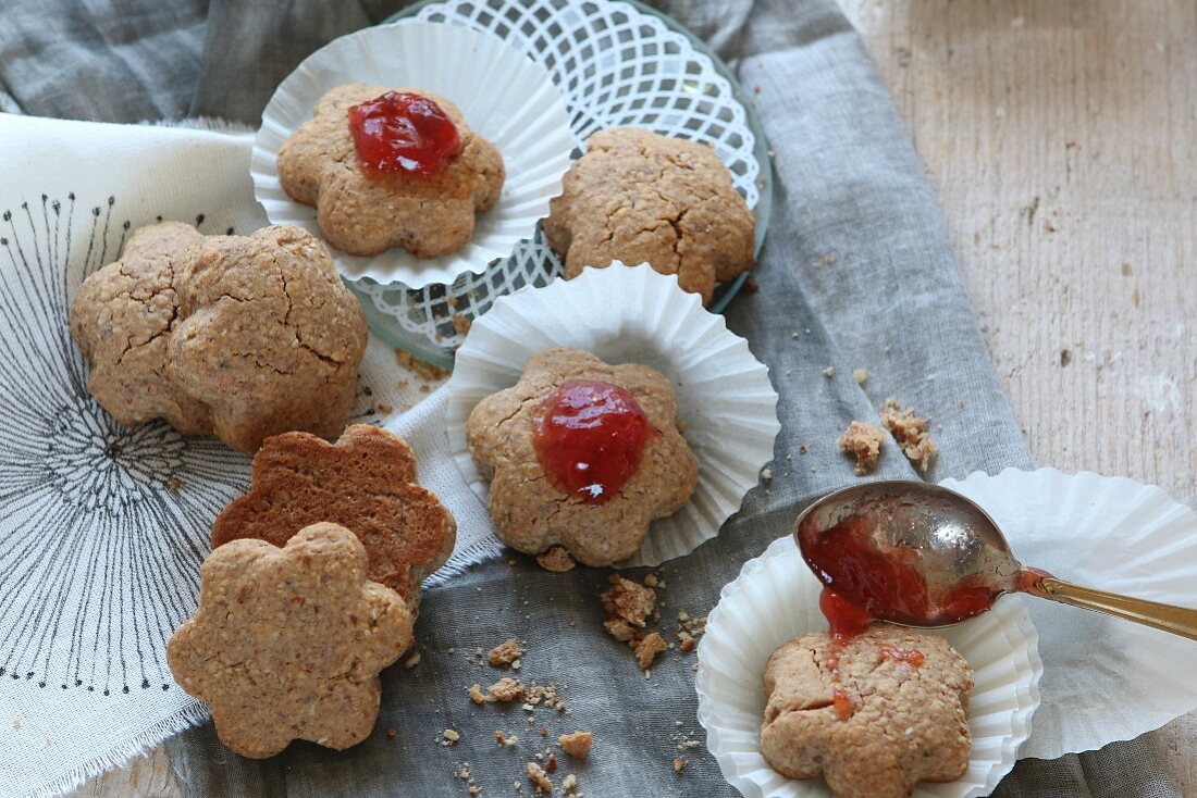 Gluten-free biscuits with a dab of raspberry jam