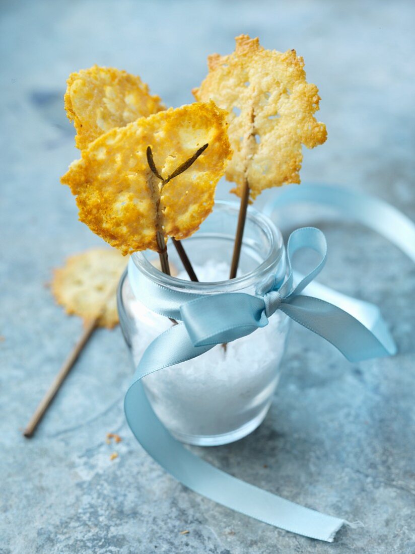 Parmesan lollipops in a glass