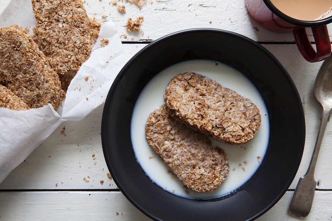 Weetabix in a bowl with a cup of tea