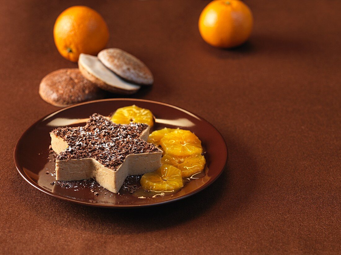 A gingerbread mousse 'star' with orange slices