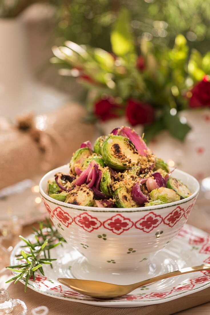 Grilled brussels sprouts with pickled red onion and chestnut crumble