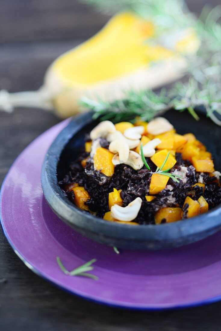 Black risotto with butternut squash and cashew nuts