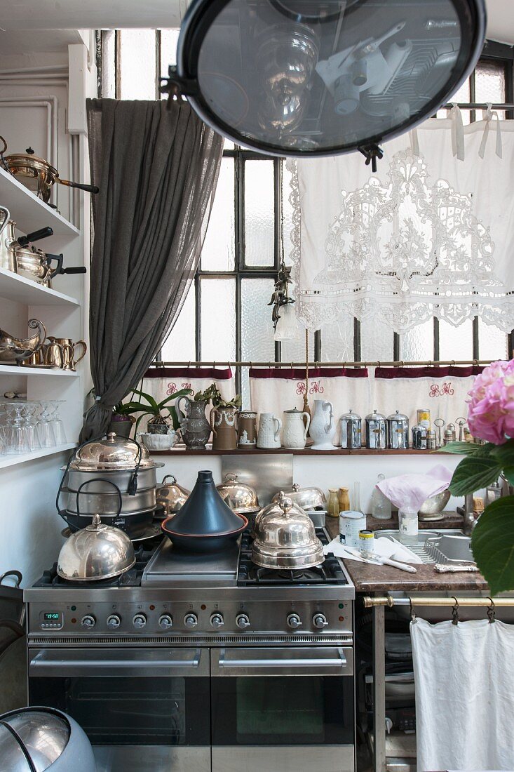 Modern gas cooker in vintage kitchen