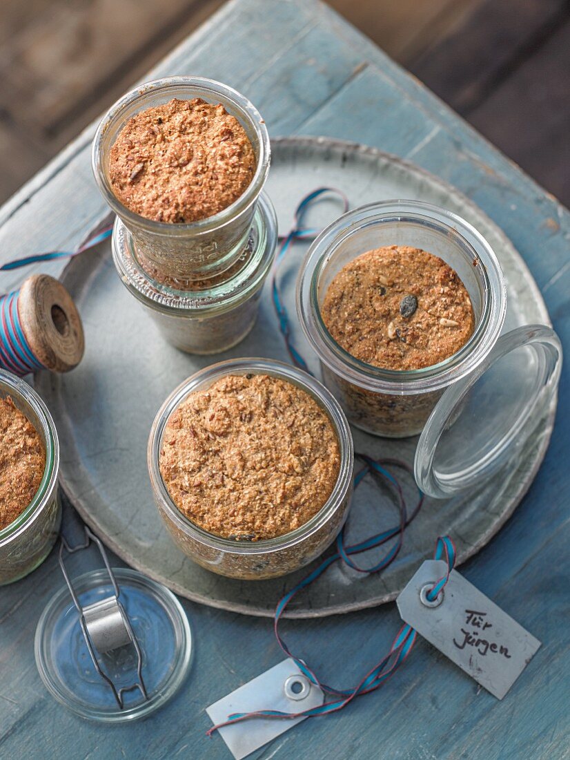 Dark grain bread in glass jars