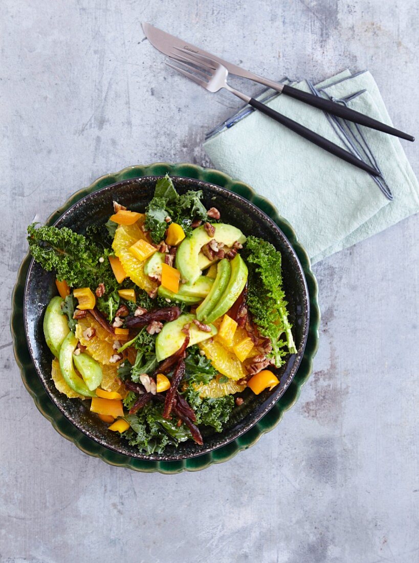 A kale salad with avocado, orange and dates - 'Super Green Hero'
