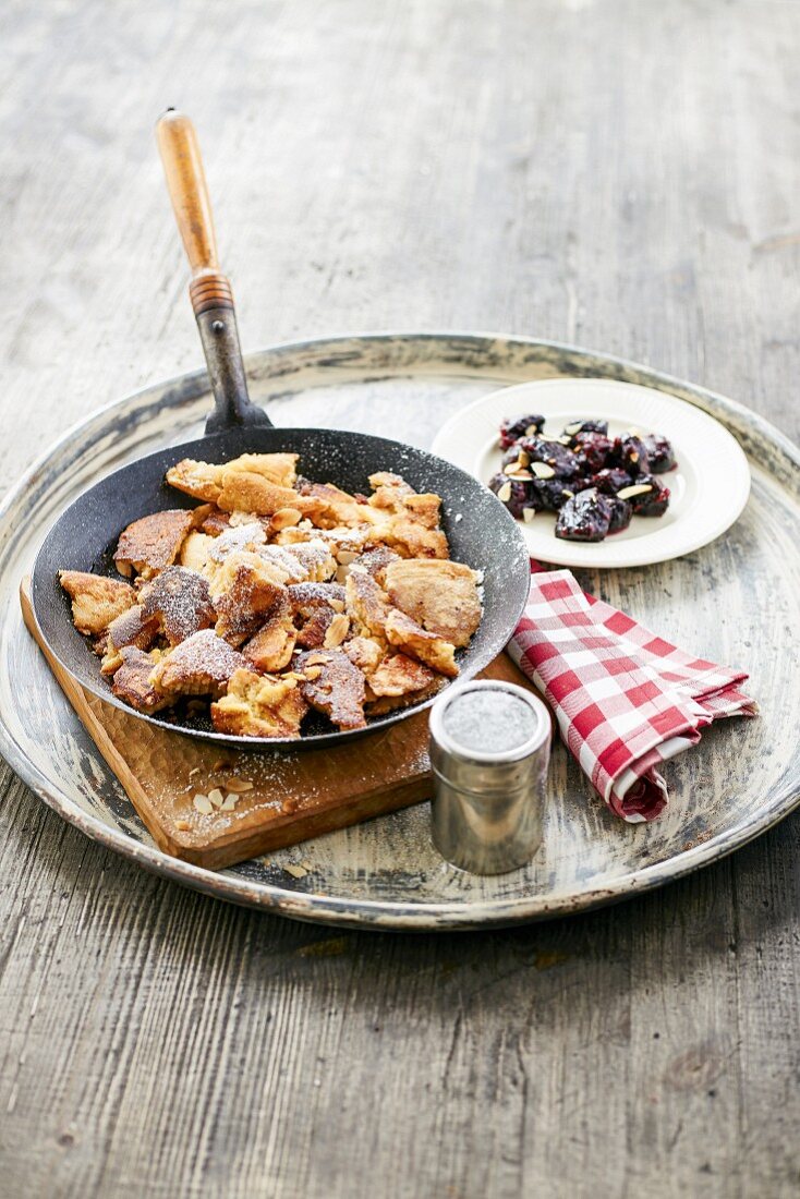 Shredded raisin pancakes with dried plum compote