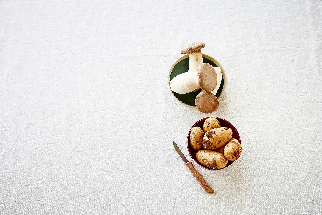 Mushrooms and potatoes (ingredients for potato and mushroom soup)