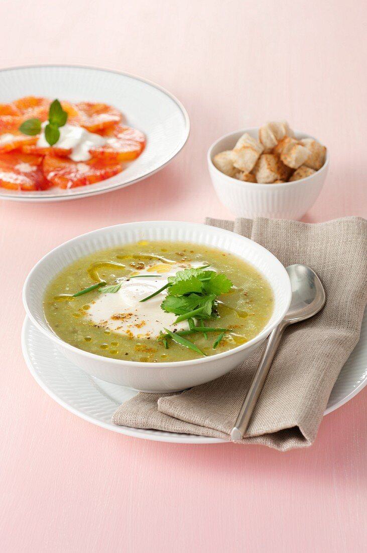 Vegetable soup with herbs and mozzarella