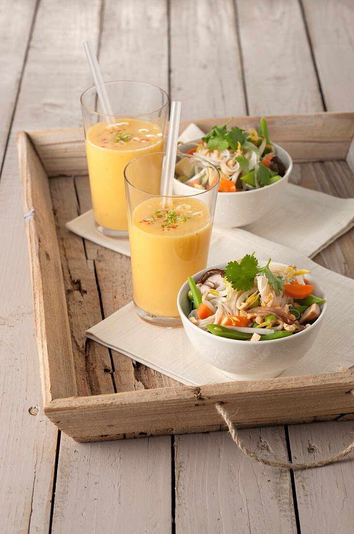 Marinated vegetables with rice noodles and mango lassi