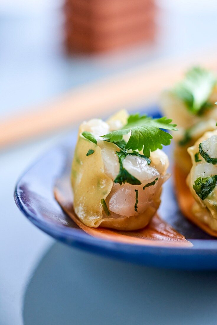 Scallops with parsley, wrapped in pastry