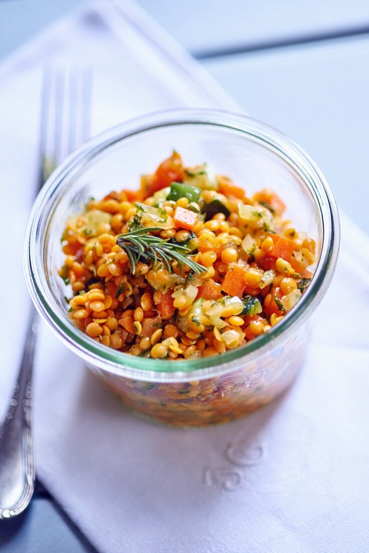 Red corail lentil salad in a glass