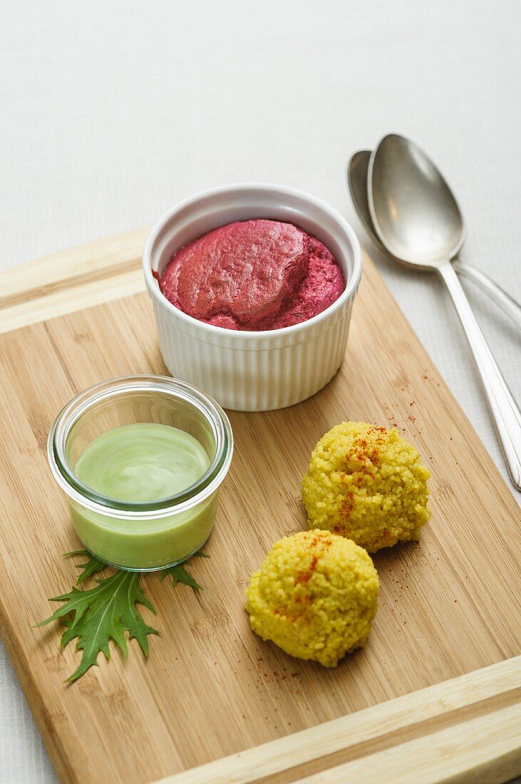 A baked beetroot soufflé with coriander sauce and couscous