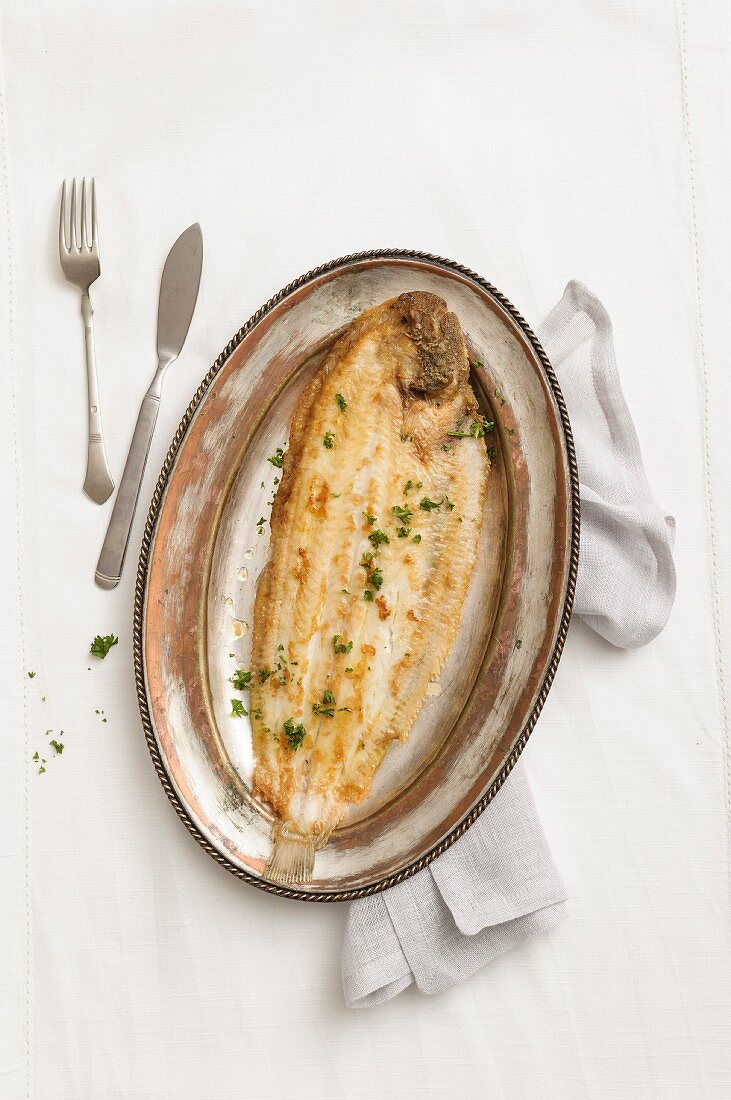 A sole with Meunière sauce and parsley
